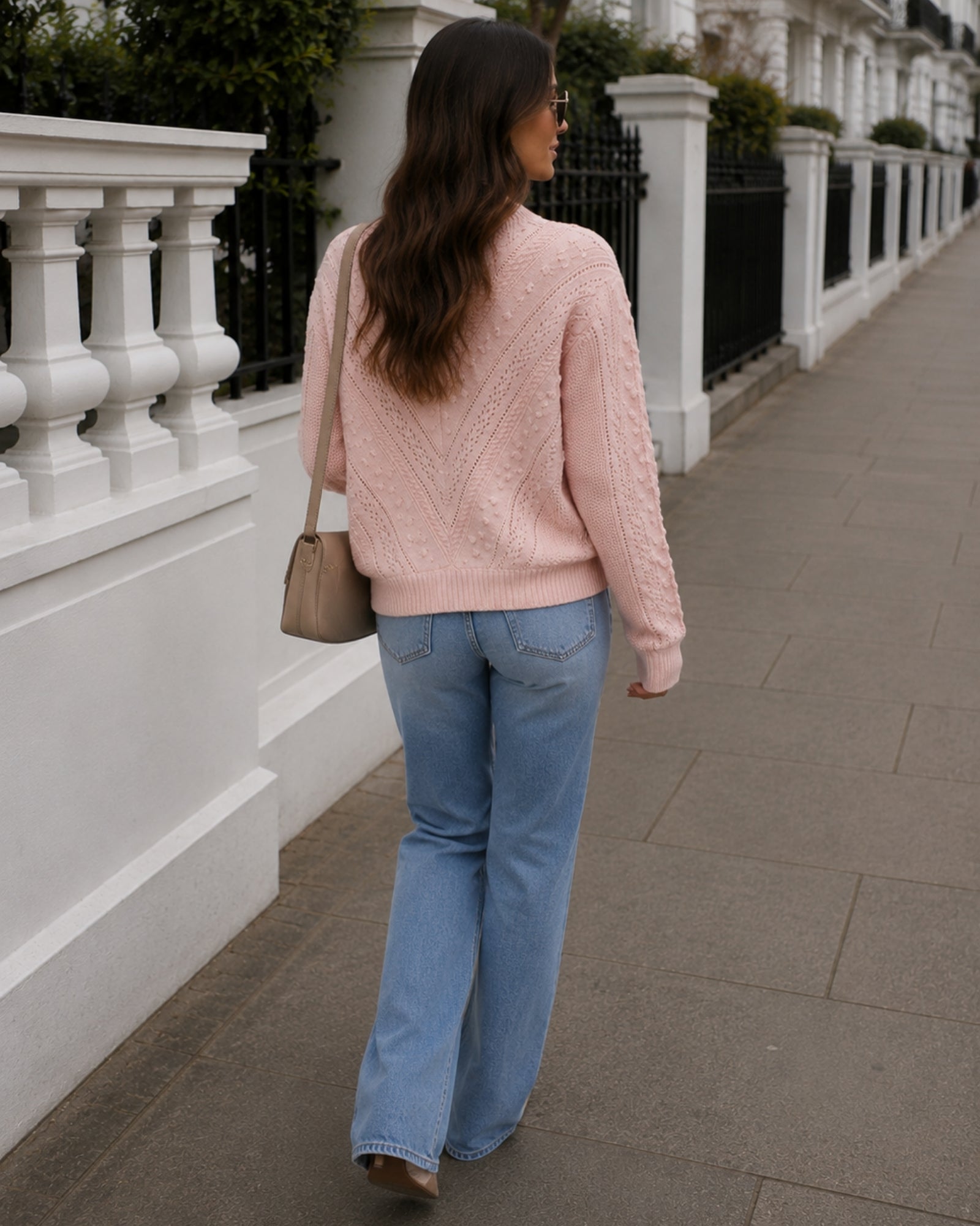 Women's pink knit jumper side view by Esther & Co