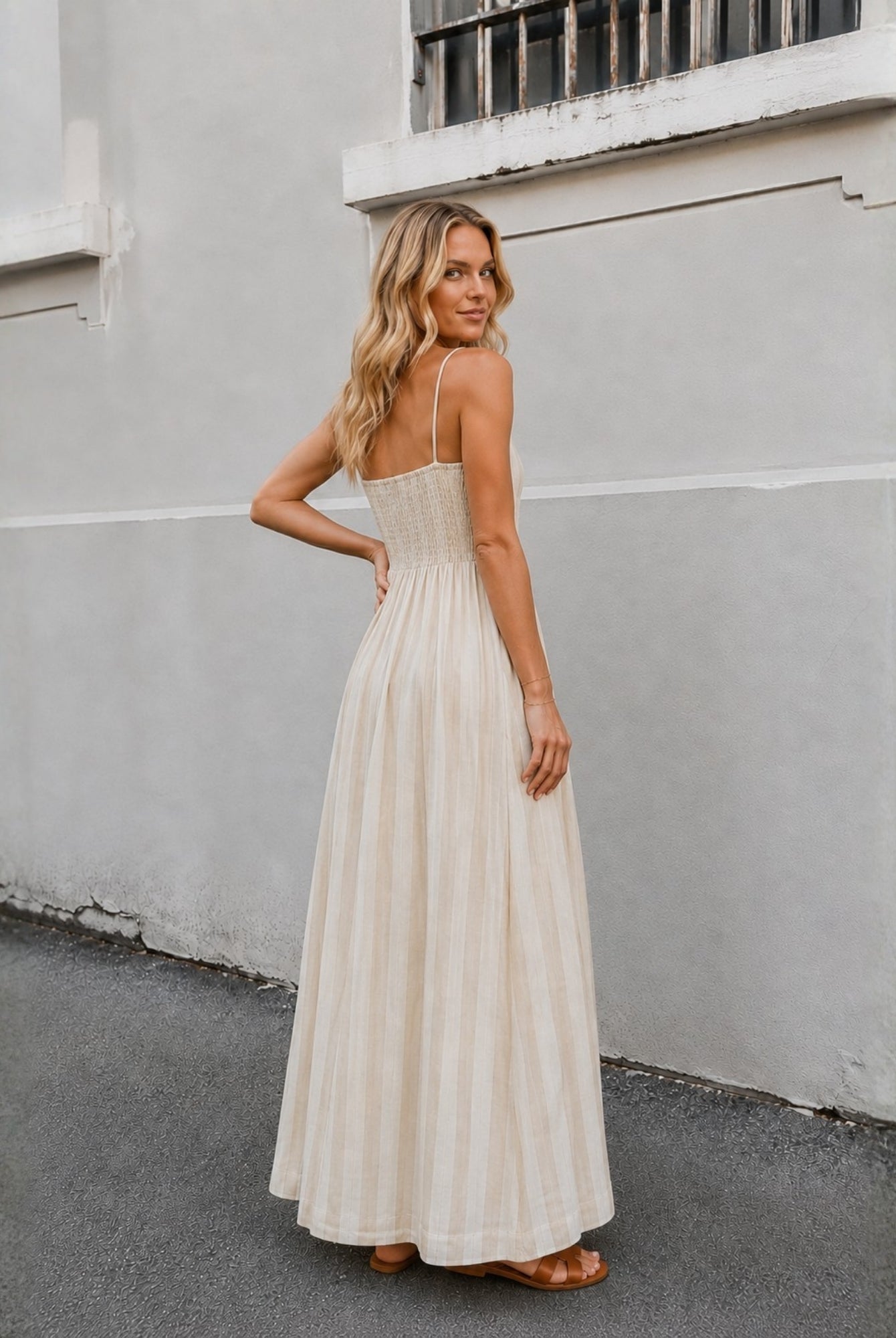 Women's beige stripe maxi dress styled outfit by Esther & Co