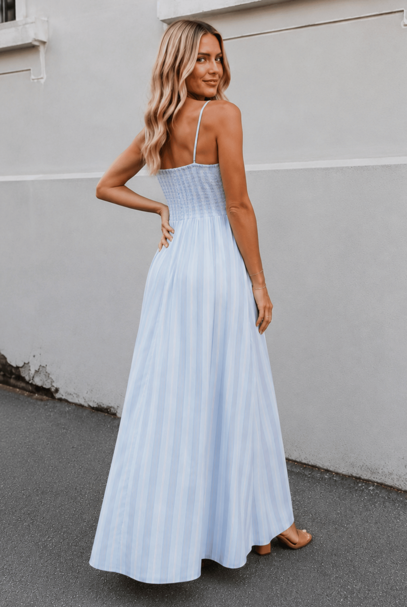 Women's blue stripe maxi dress side view by Esther & Co