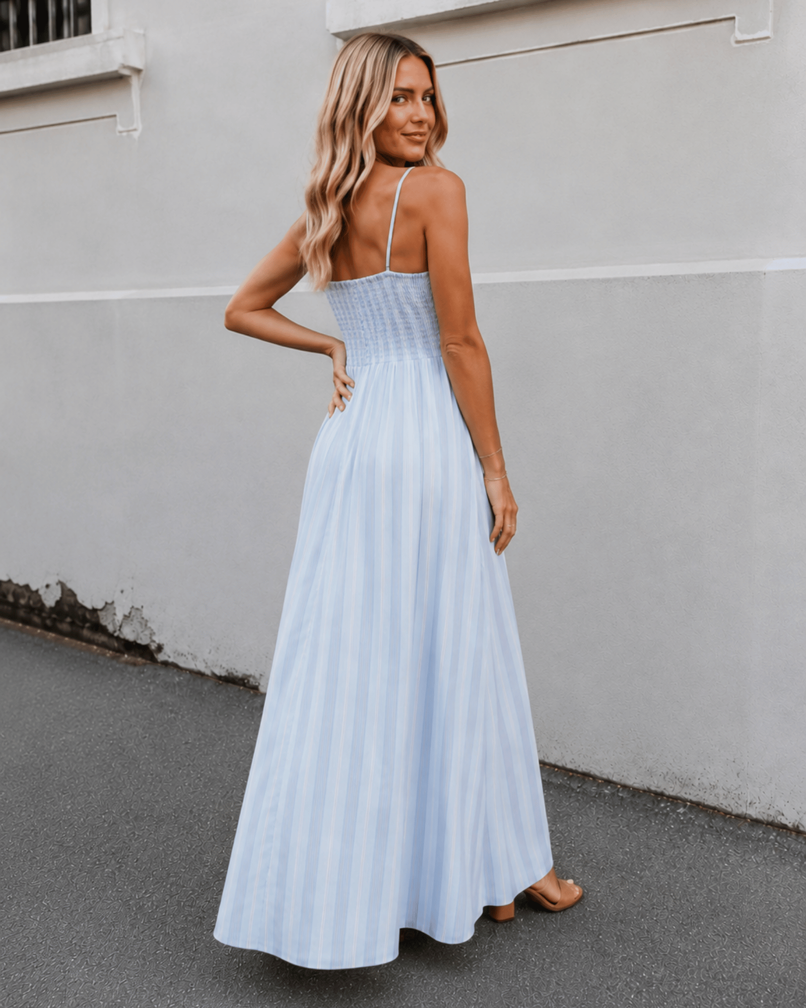 Women's blue stripe maxi dress side view by Esther & Co