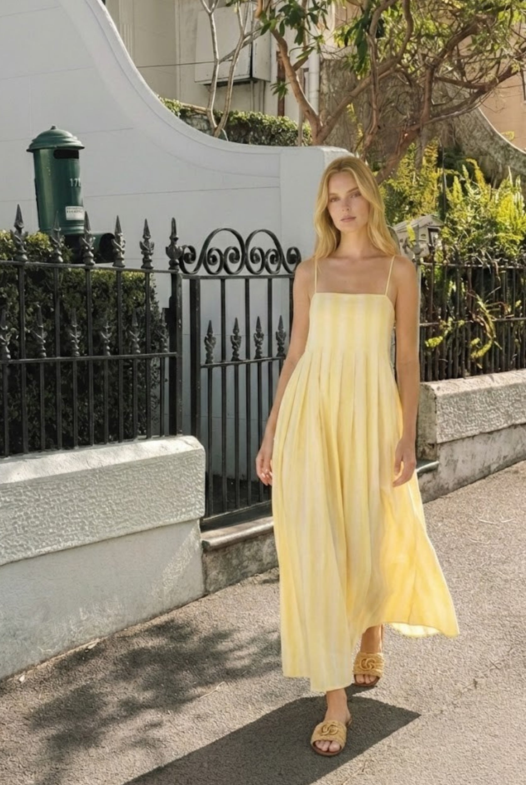 Women's yellow stripe maxi dress with adjustable straps by Esther & Co