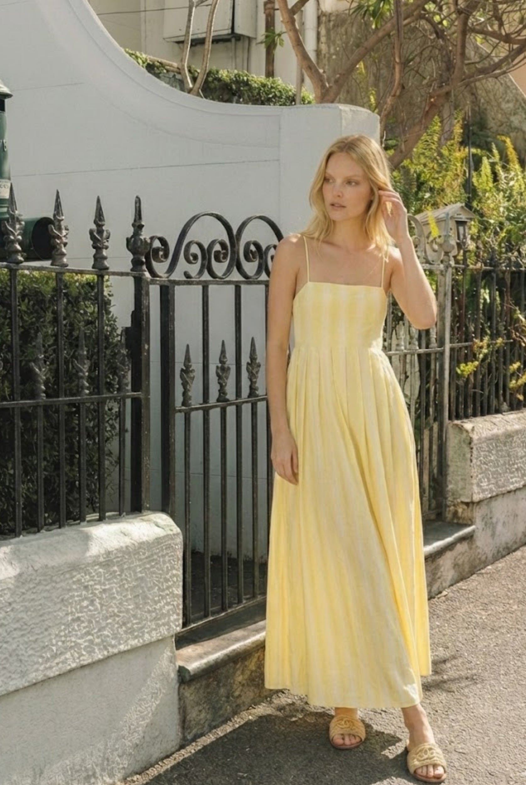 Women's yellow stripe maxi dress detail view by Esther & Co