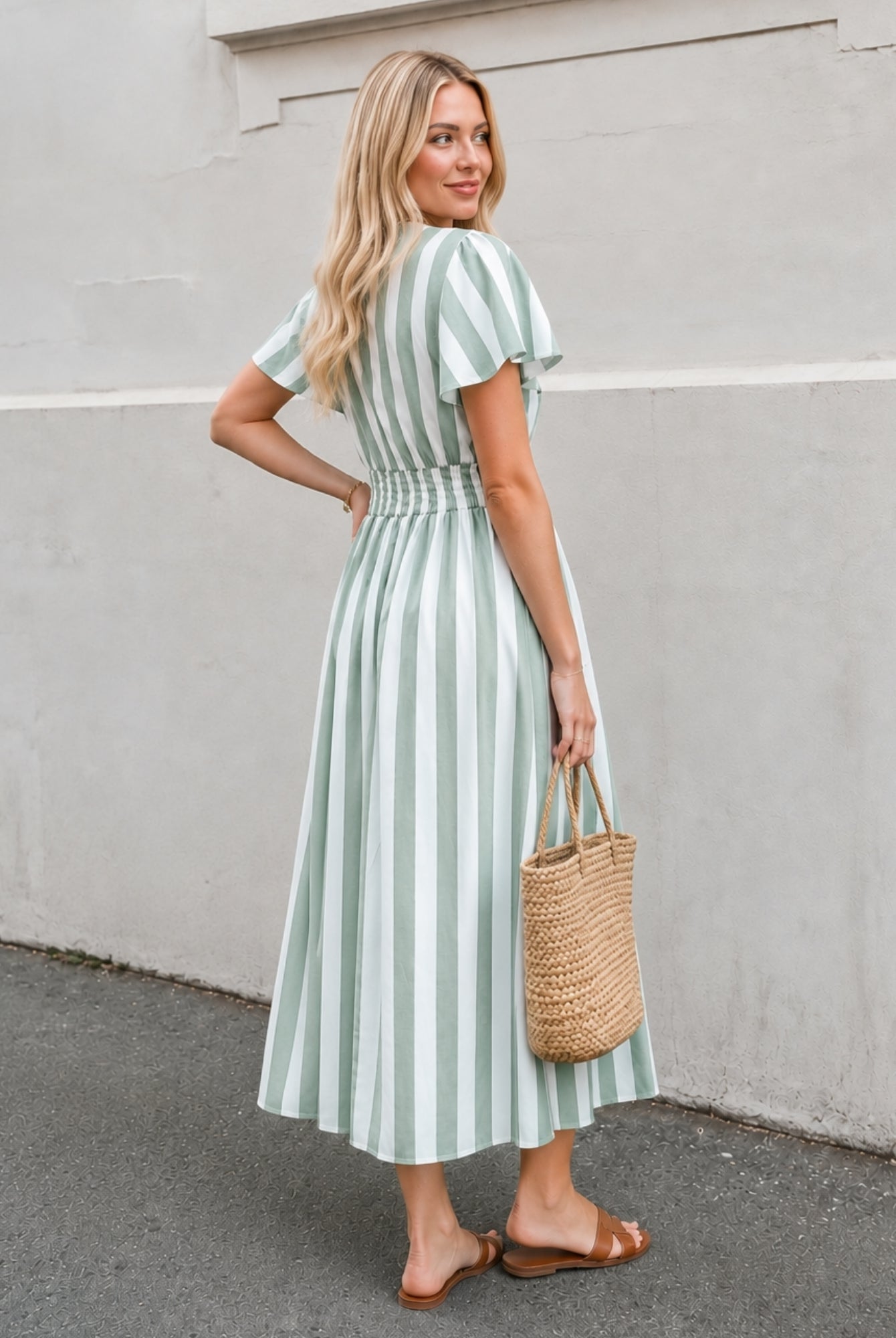 Women's green striped A-line midi dress side view by Esther & Co