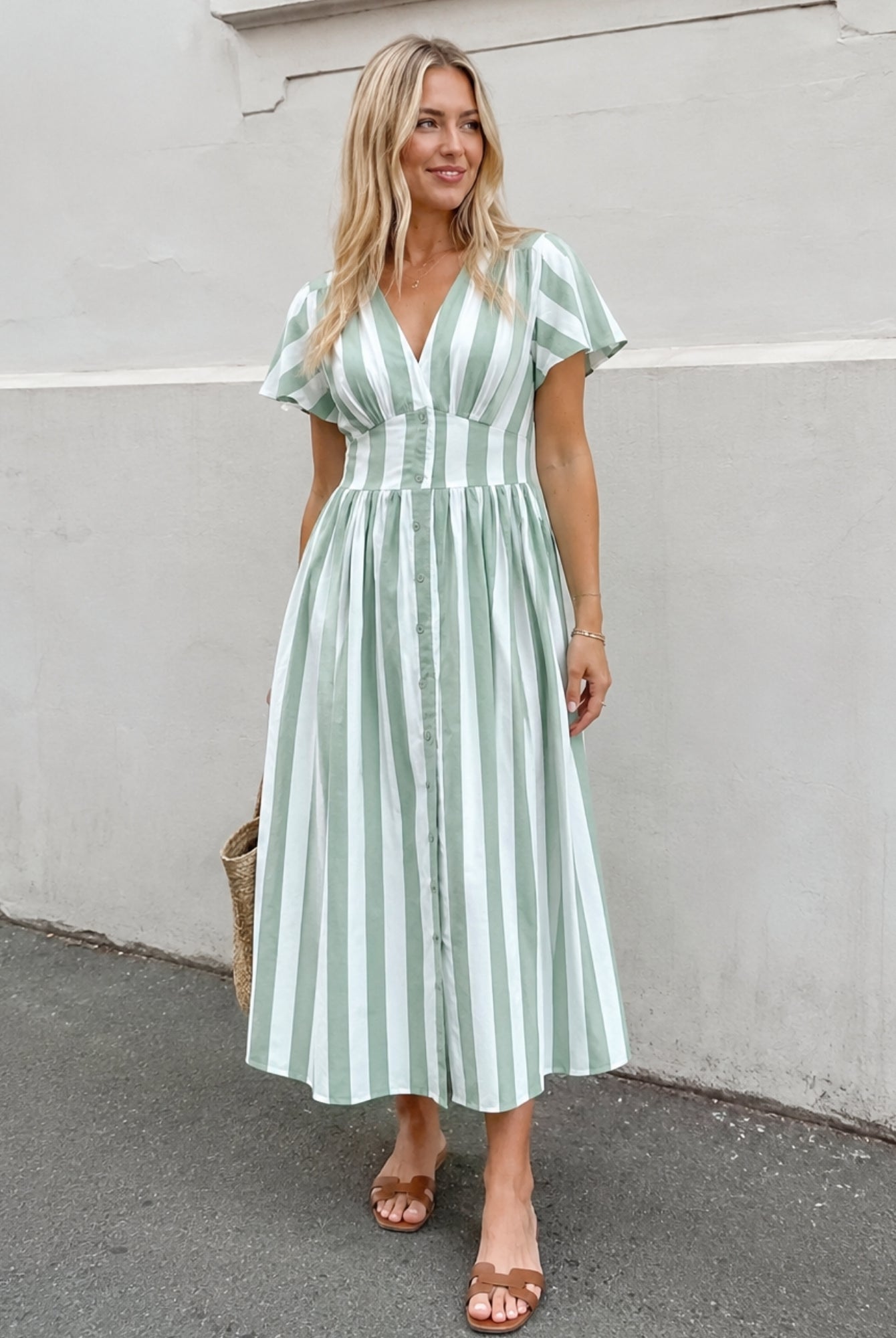 Women's green and white striped midi dress with flutter sleeves, the Rhona Dress in Green Stripe by Esther & Co