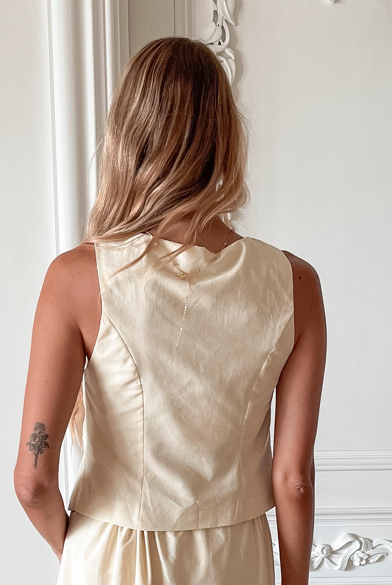 Women's yellow sleeveless tie front top back view by Esther & Co