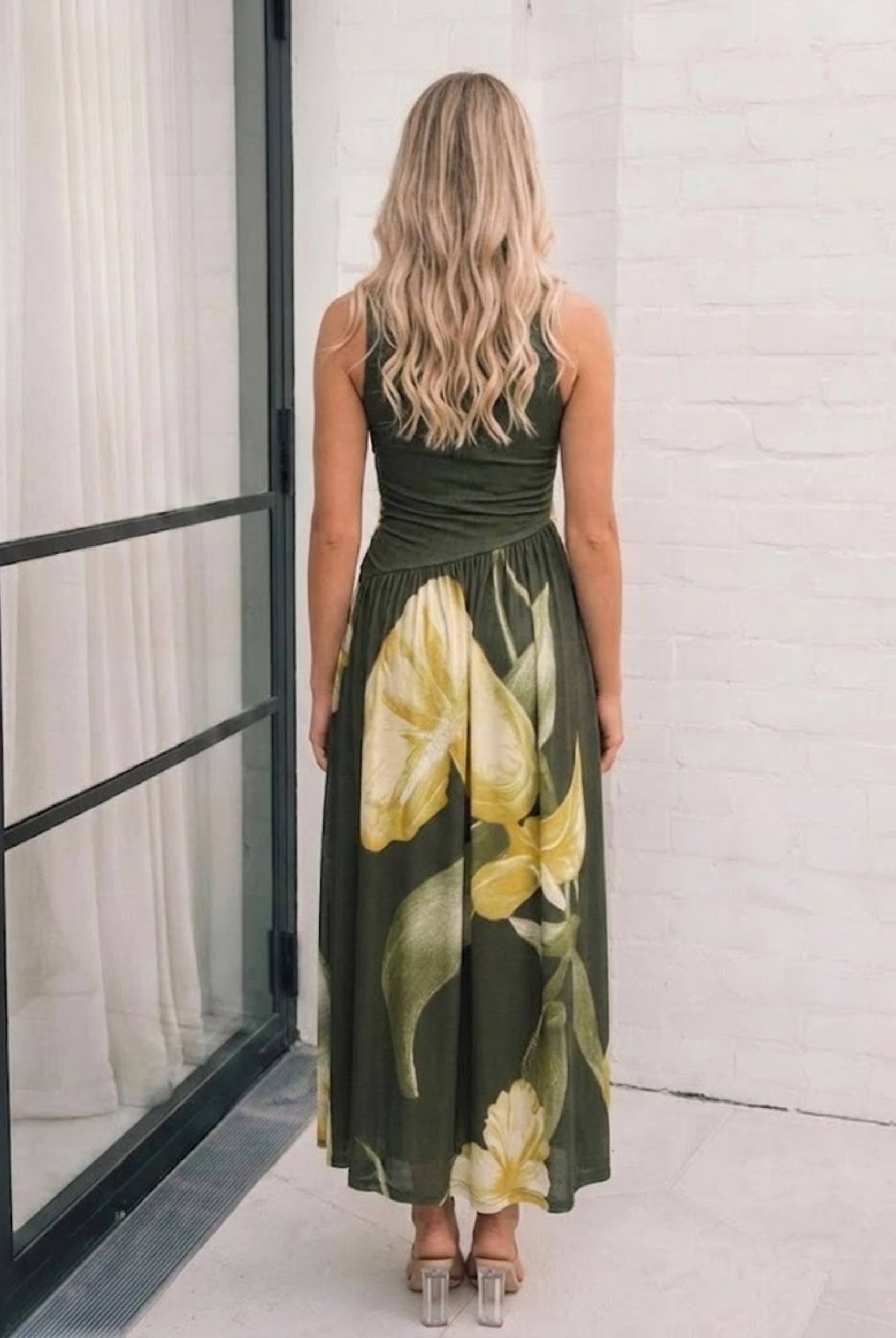 Sandrine Dress in Olive Floral olive floral maxi dress with ruched bodice and high neckline side view