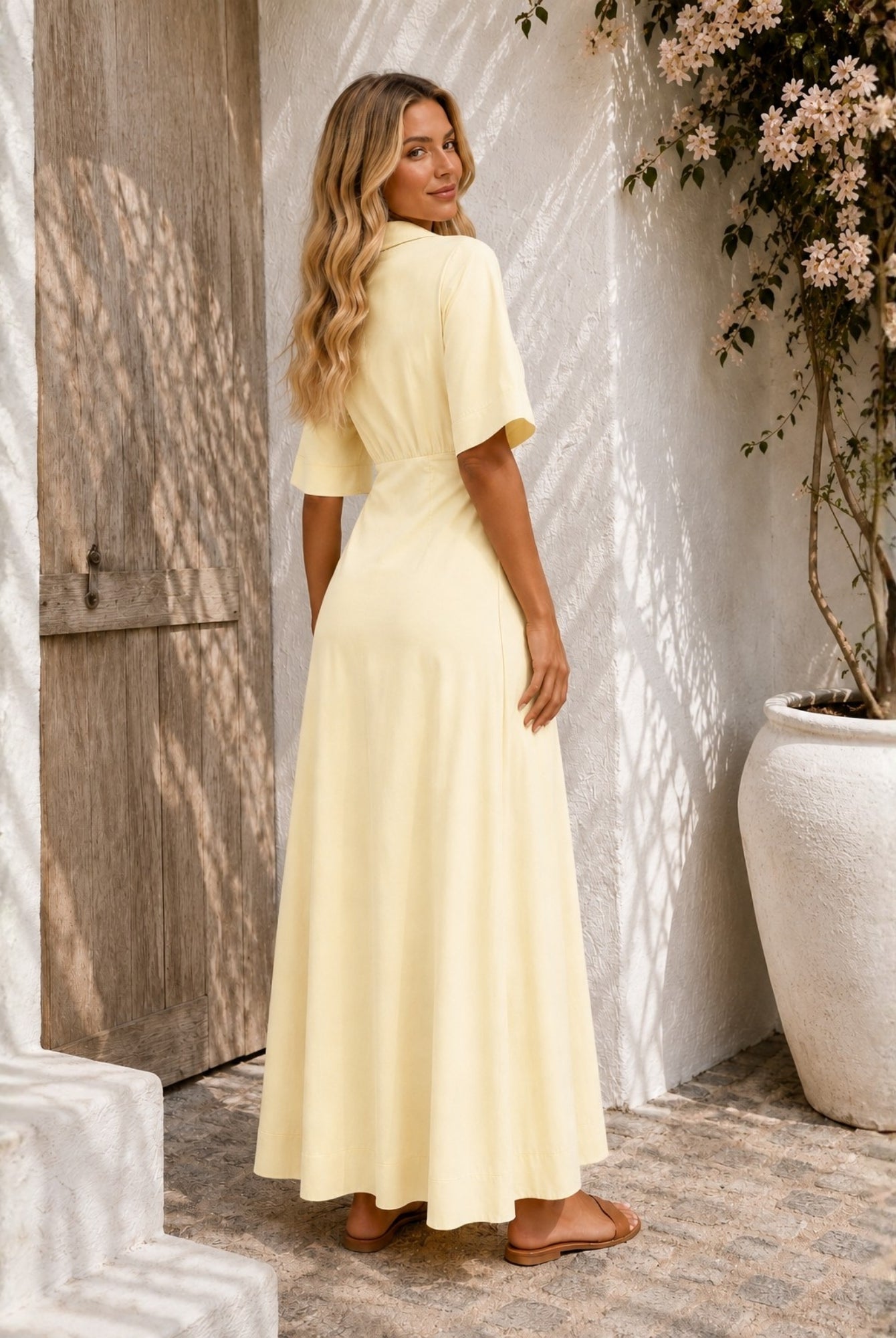 Women's pastel yellow v-neck wrap dress with collar, the Sephora Dress in Buttercream by Esther & Co