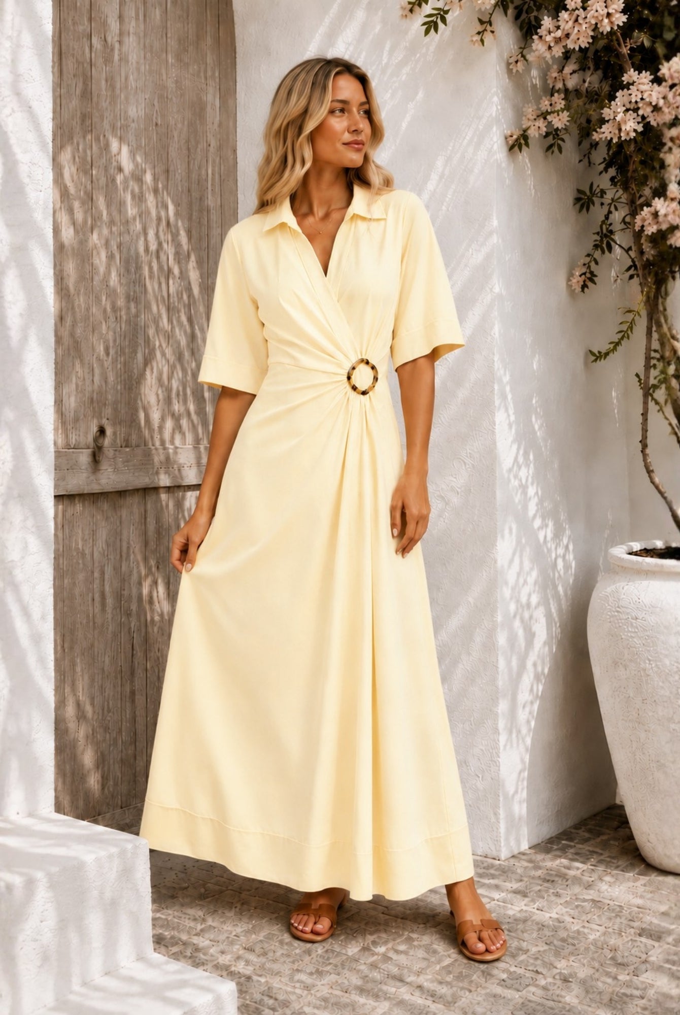 Women's pastel yellow short sleeve wrap dress with A-line skirt, the Sephora Dress in Buttercream by Esther & Co