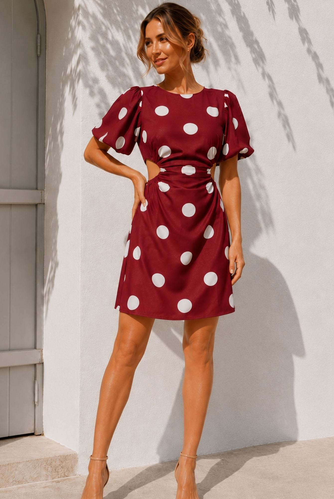 Women's wine polka dot puff sleeve mini dress, the Shahnaz Dress in Wine Spot by Esther & Co
