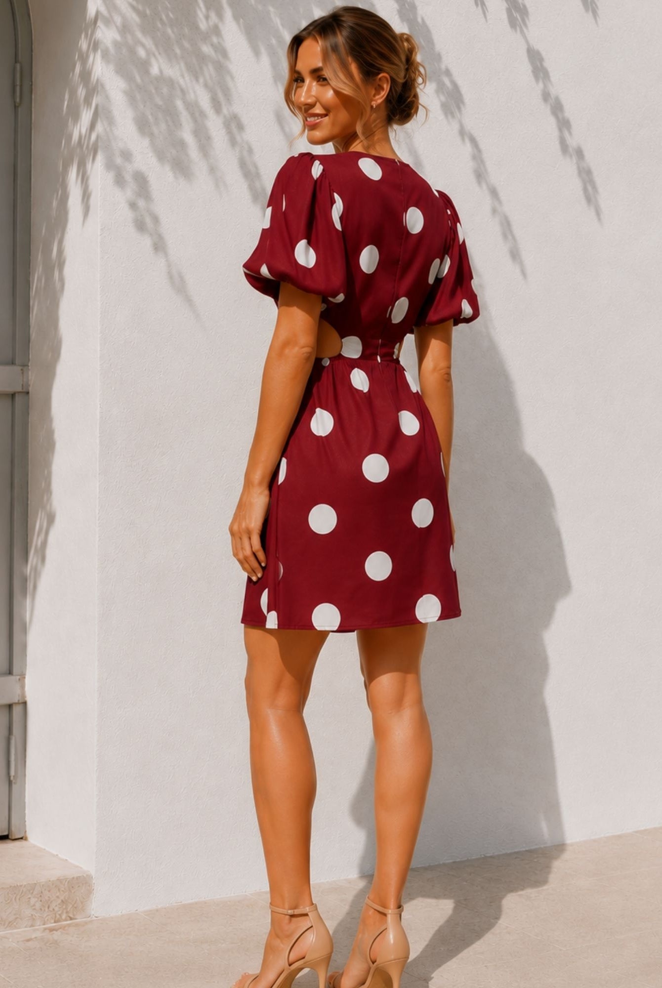 Women's wine polka dot mini dress detail view by Esther & Co