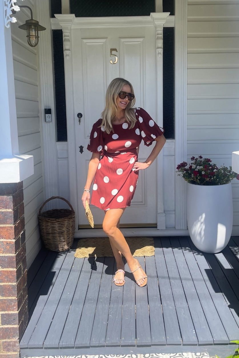 Women's wine polka dot mini dress styled outfit by Esther & Co