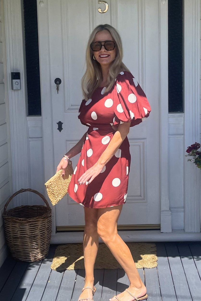 Women's wine polka dot puff sleeve mini dress full length view by Esther & Co