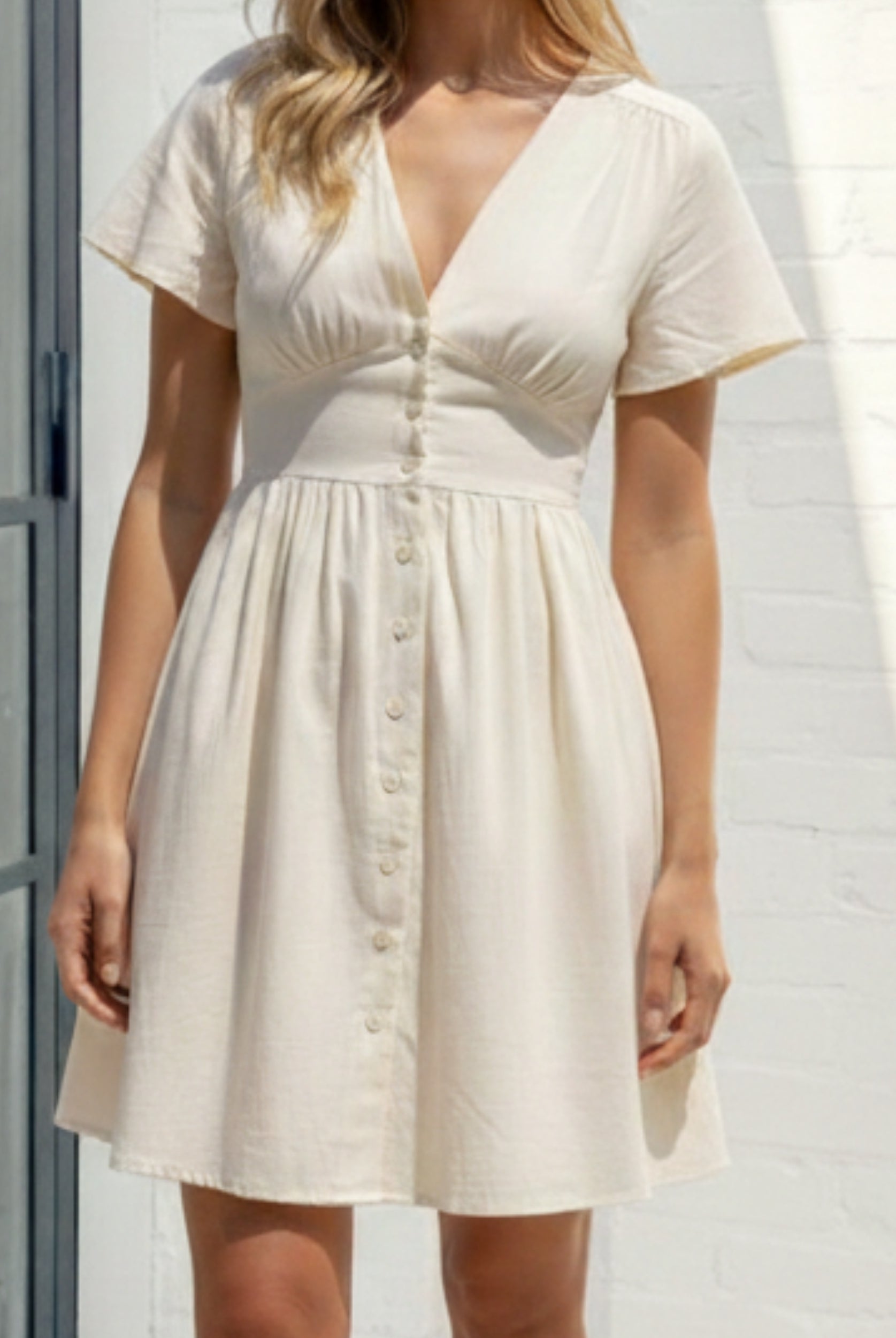 Women's cream button front mini dress full length view by Esther & Co