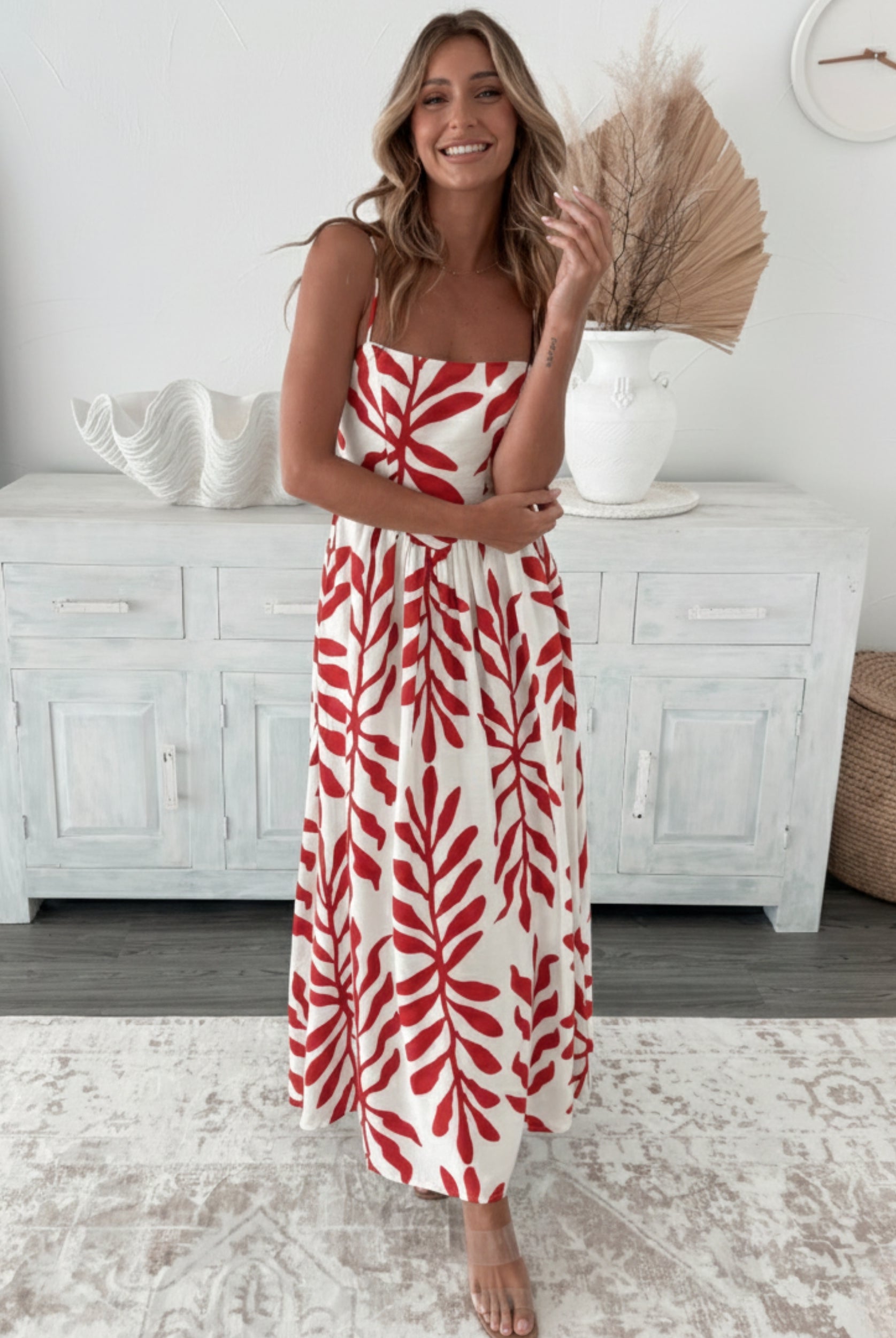 Women's red print midi dress styled outfit by Esther & Co