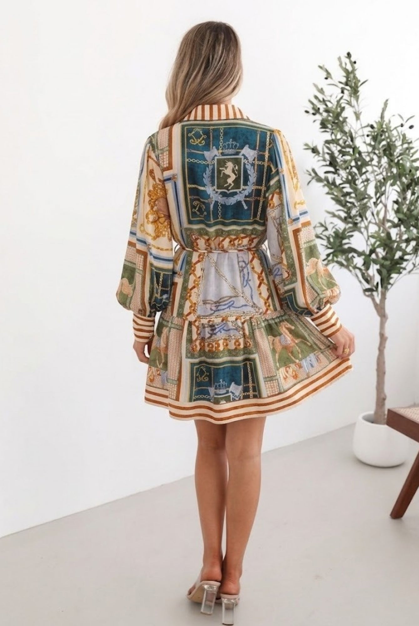 Women's printed collared mini dress with button down front by Esther & Co