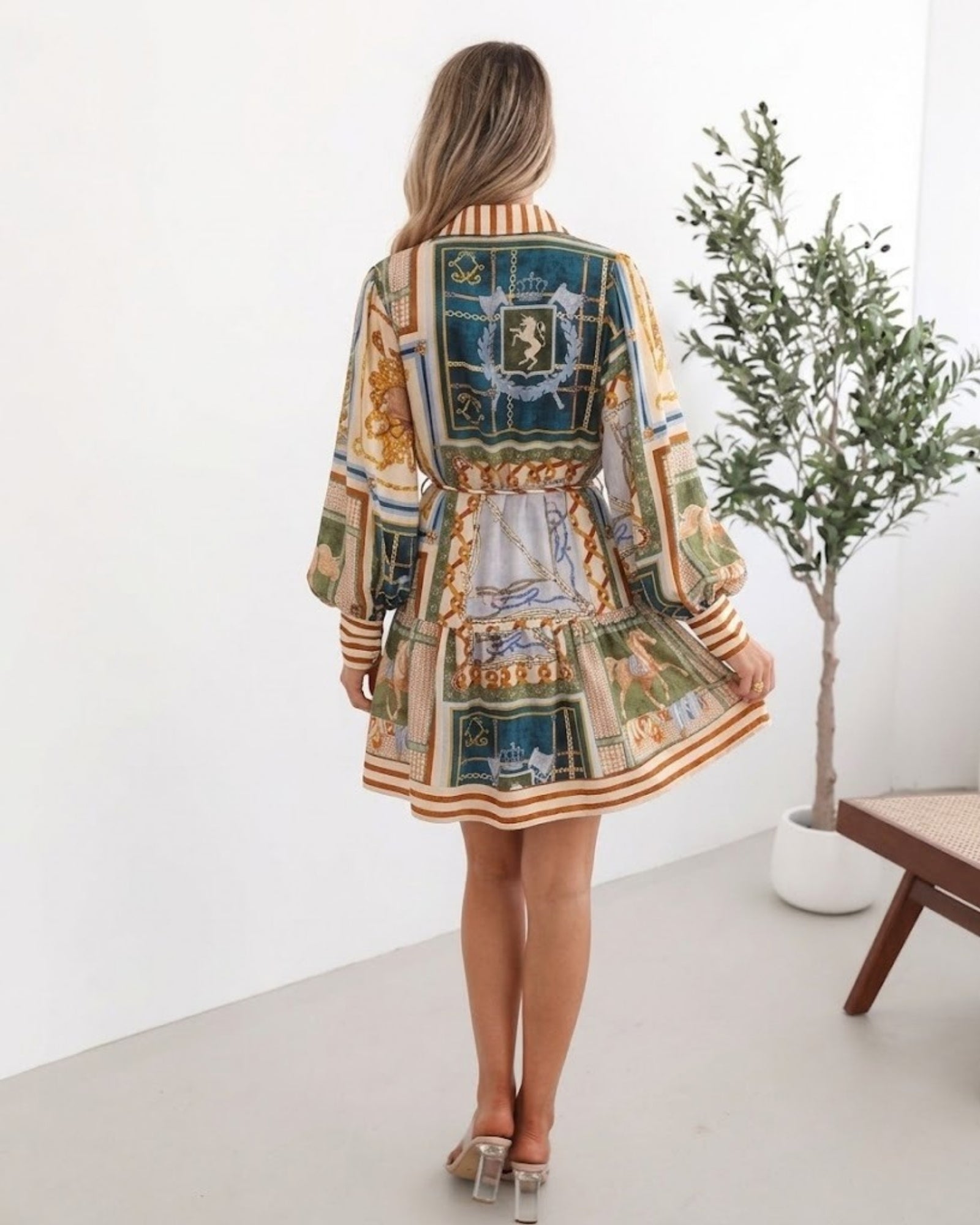 Women's printed collared mini dress with button down front by Esther & Co