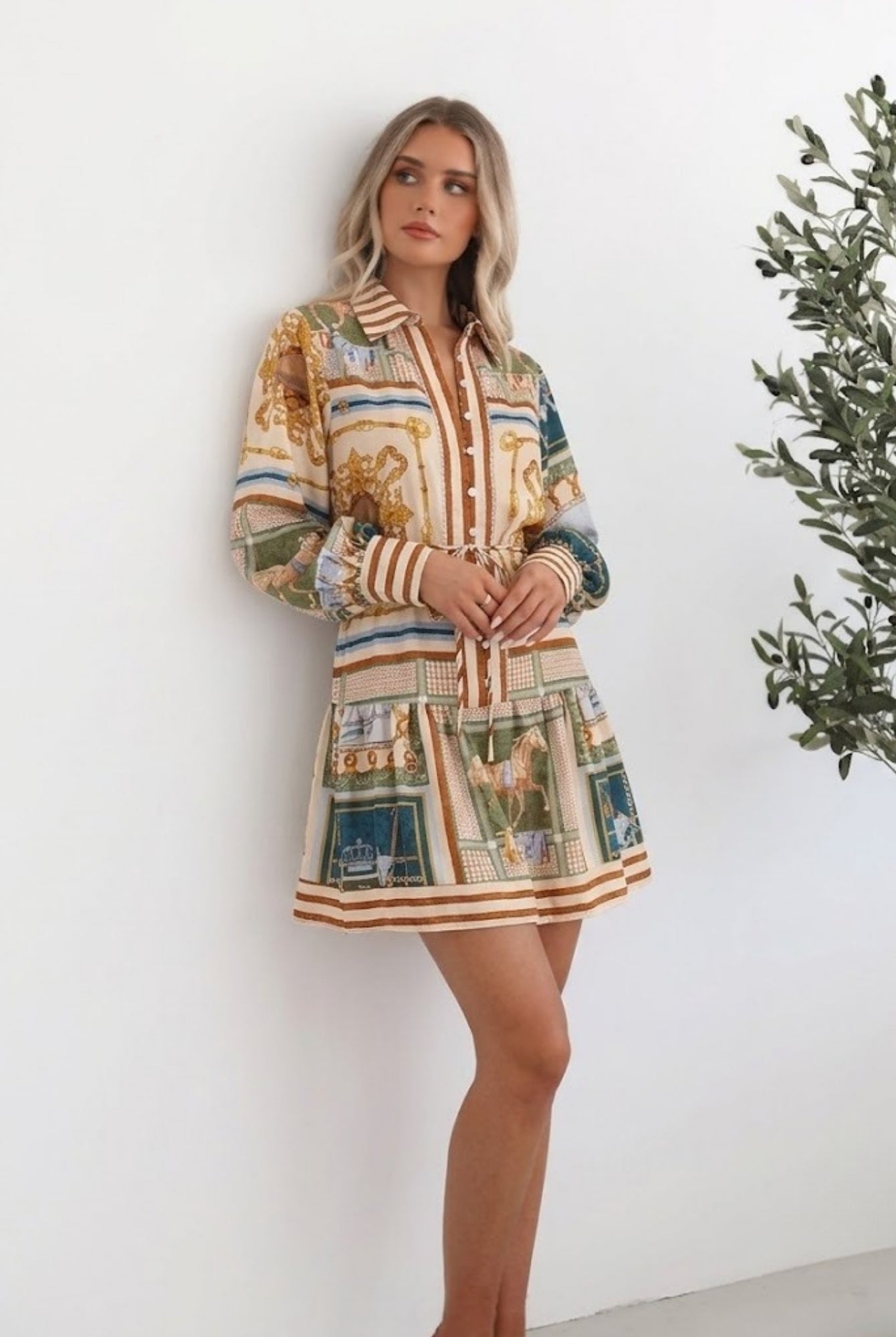 Women's printed mini shirt dress with striped balloon sleeve cuffs by Esther & Co