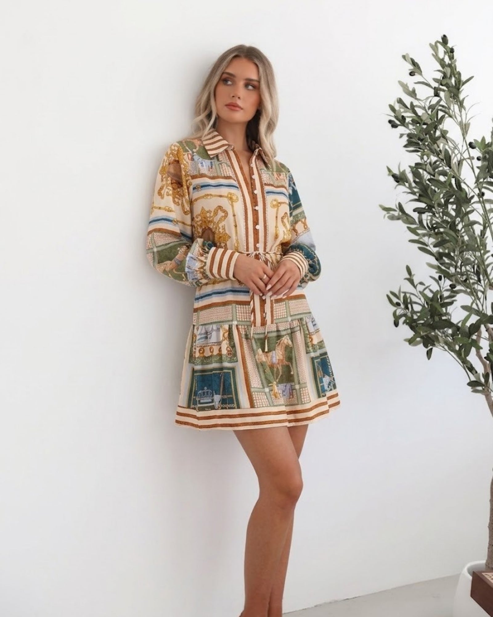 Women's printed mini shirt dress with striped balloon sleeve cuffs by Esther & Co