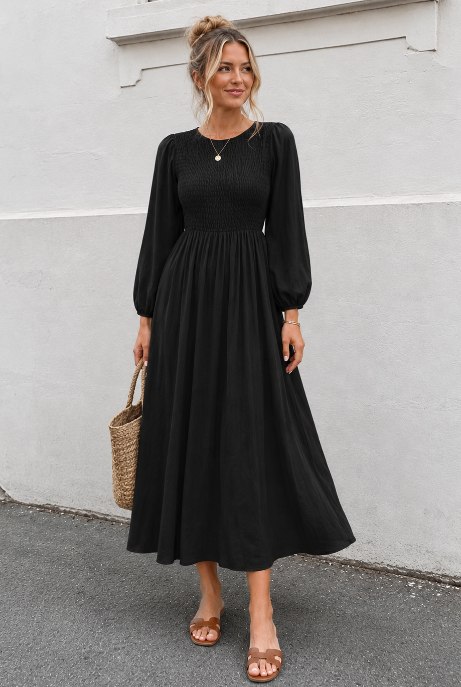 Women's black long sleeve cotton midi dress with smocked bodice, the Iolana Dress in Black Long Sleeve by Esther & Co