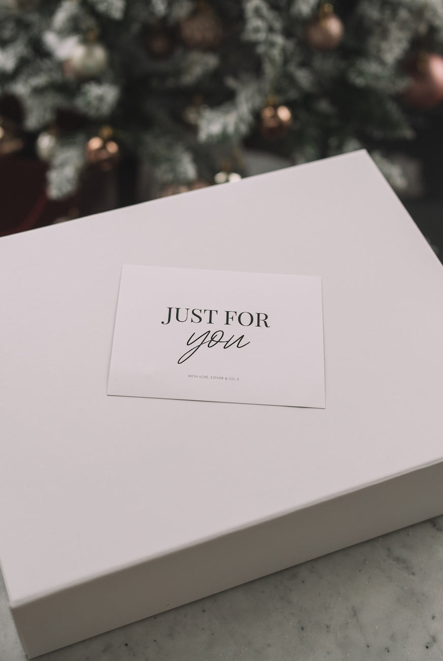 Esther & Co white gift wrapping, styled presentation
