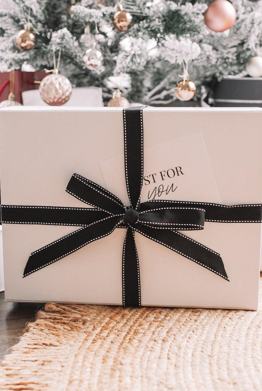 White gift wrapping with ribbon, Esther & Co gift wrapping