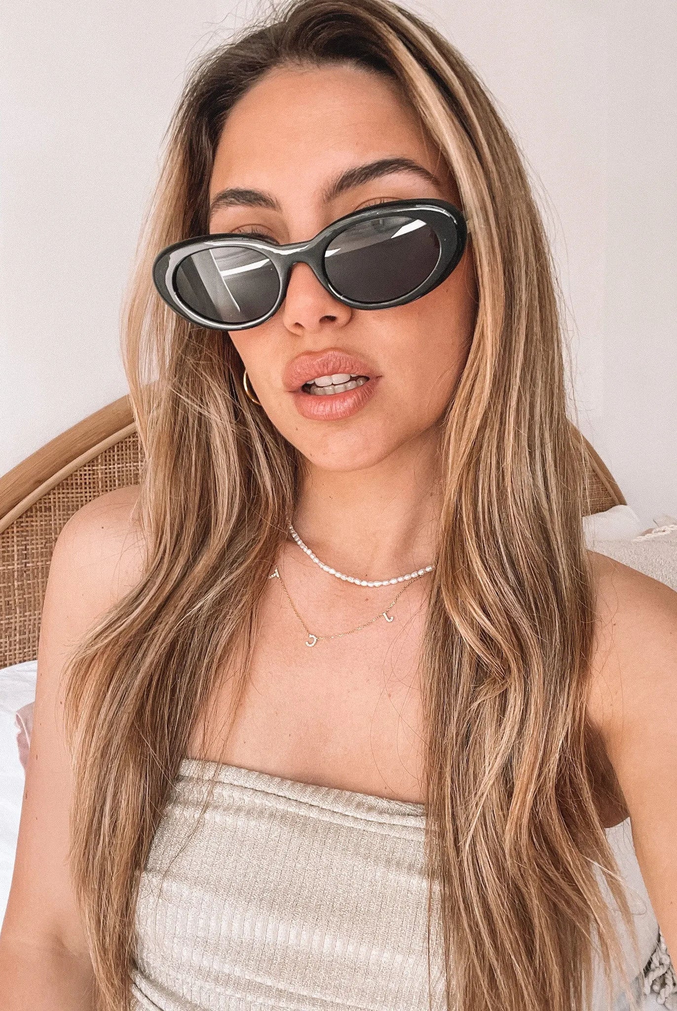 Margot black sunglasses, angle view