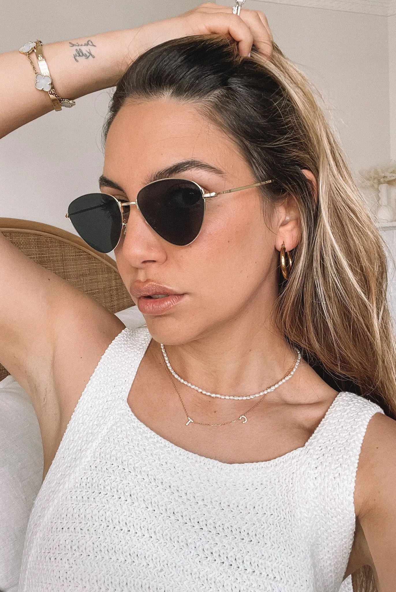 Cora gold-tone sunglasses, folded view