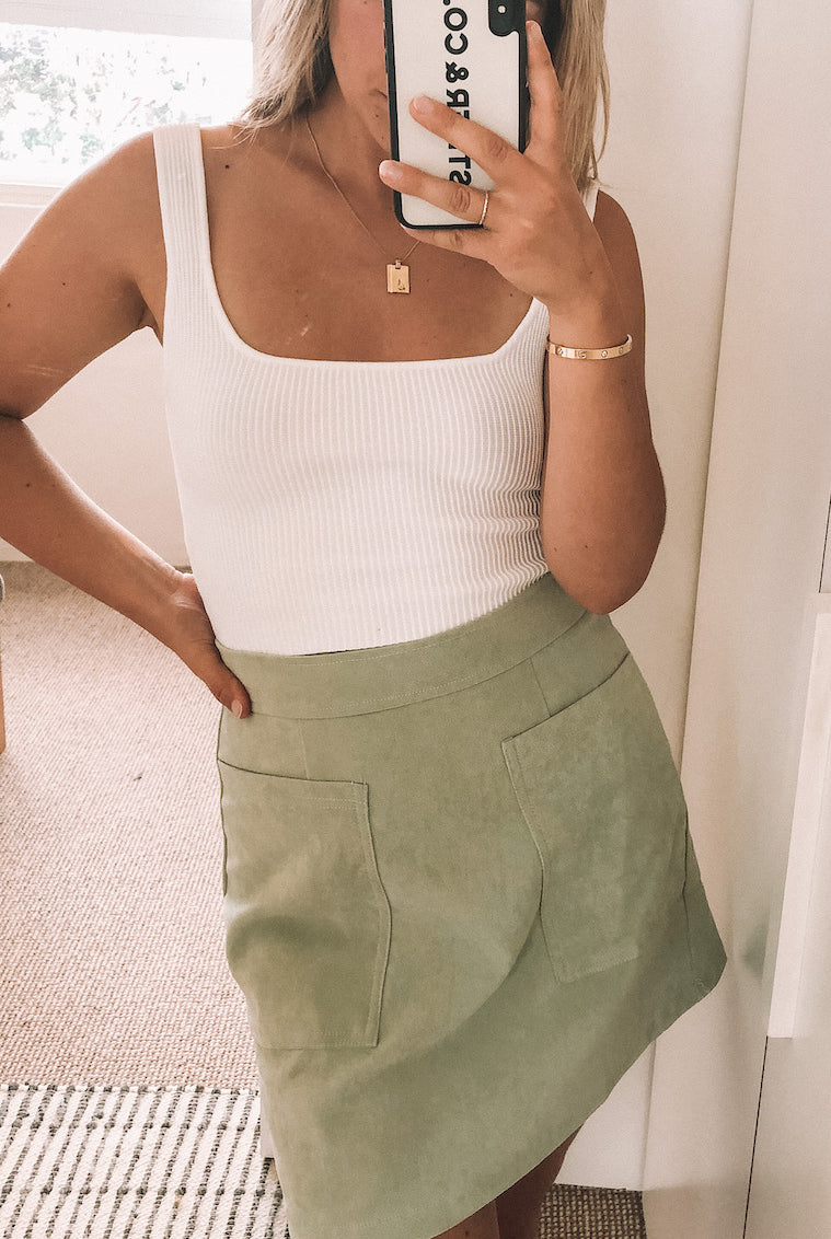 Women's sage green fitted mini skirt, the Amba Skirt in Sage by Esther & Co