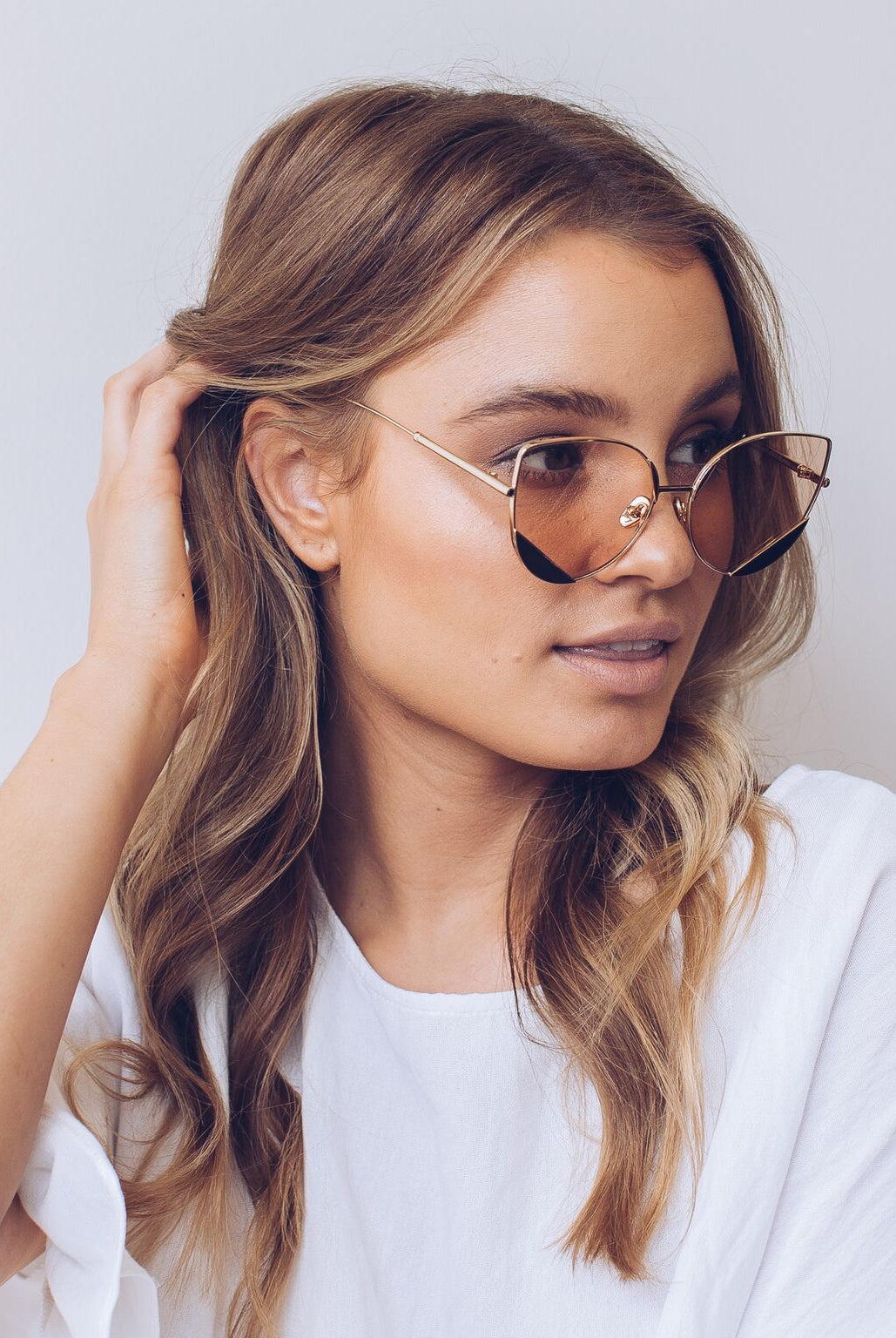 Cadence blush sunglasses, angle view