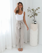 Alma Pants in Beige womens beige wide leg trousers back view