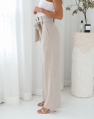 Alma Pants in Beige high waist wide leg trousers in beige side view