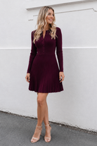 Women's maroon knit midi dress with round neckline and long sleeves, the Marifi Knit Dress in Maroon by Esther & Co