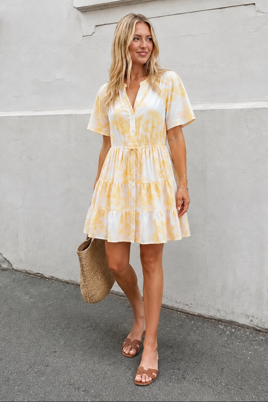 Women's printed mini dress with structured pleated bodice, the Sulani Dress in Sunkissed Gem by Esther & Co