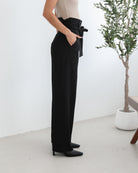 Alma Pants in Black black wide leg trousers with side pockets and detachable belt side view