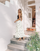 Women's white polka dot maxi dress styled outfit by Esther & Co