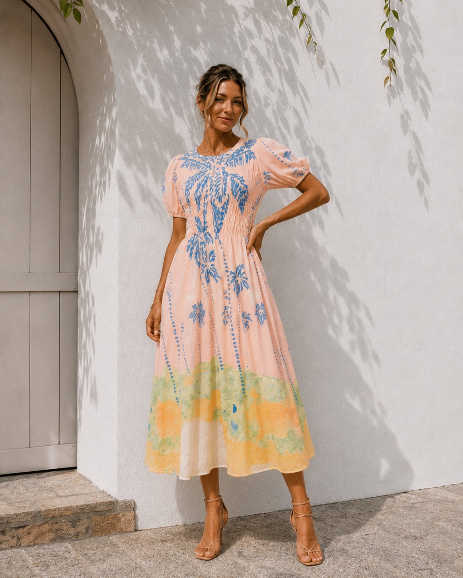 Women's pastel pink embroidered midi dress with border hem detail, the Aseana Dress in Island Dream by Esther & Co
