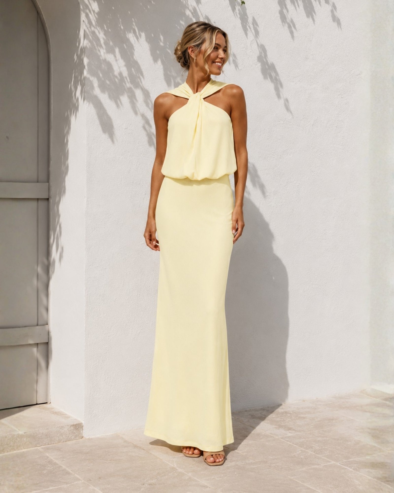 Women's lemon chiffon halter maxi dress, the Ashtine Dress in Lemon Chiffon by Esther & Co