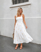 Women's white print maxi dress side view by Esther & Co