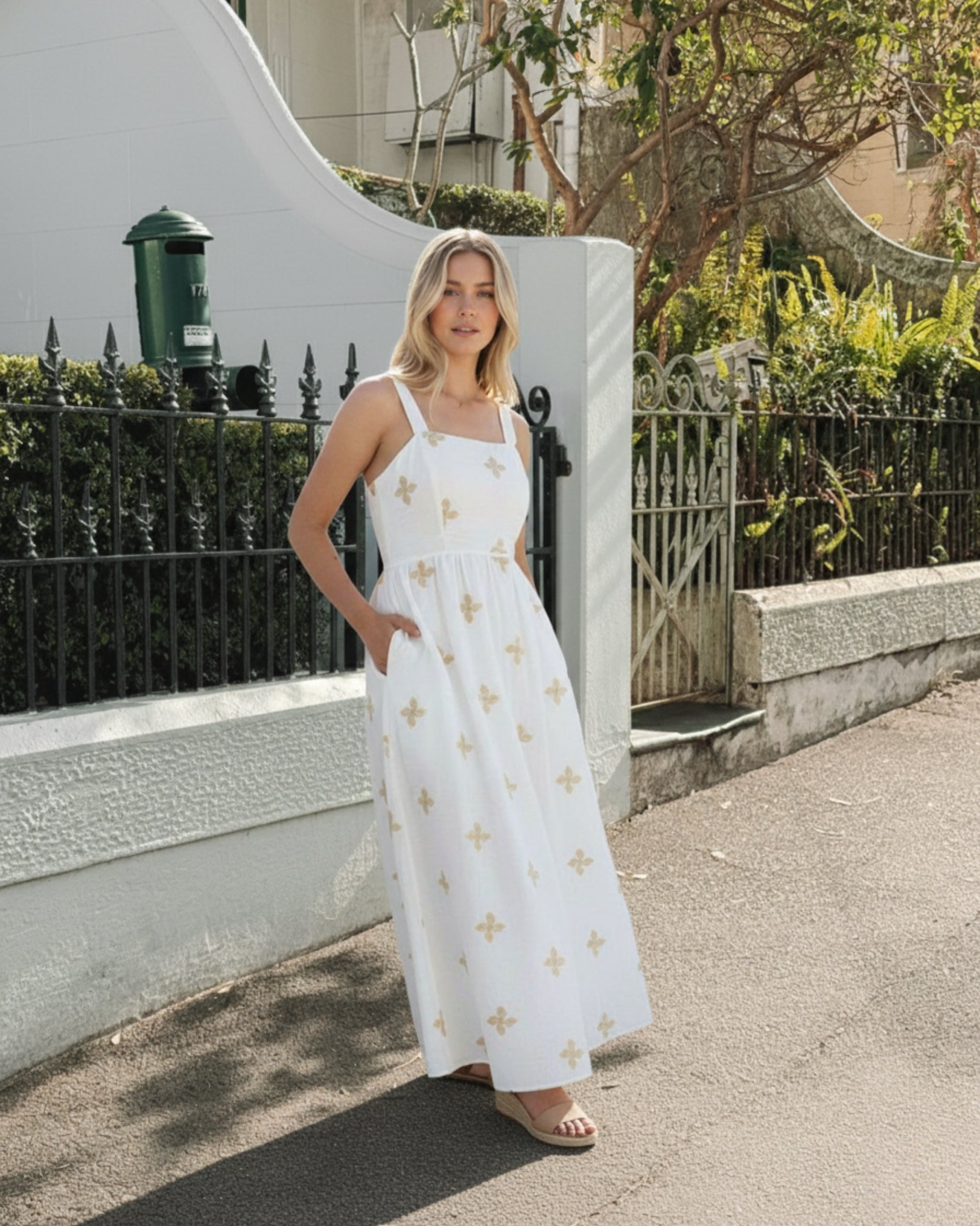 Women's white floral maxi dress styled outfit by Esther & Co