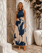 Women's navy floral maxi dress side view, the Balayage Dress in Navy Floral by Esther & Co