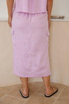 Women's lilac high-waisted midi skirt side view by Esther & Co