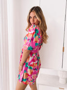 Women's pink print playsuit with puff sleeves by Esther & Co
