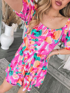 Women's pink fiesta playsuit styled for holiday by Esther & Co