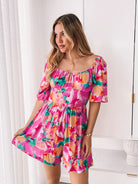 Women's pink fiesta print playsuit with sweetheart neckline, the Carolana Playsuit in Pink Fiesta by Esther & Co