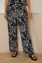 Women's printed wide-leg pants with quarter-zip closure by Esther & Co
