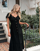 Celie black linen midi dress, back view