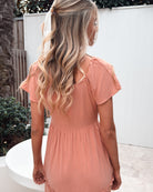 Celie Dress in Rust faded rust linen midi dress side view