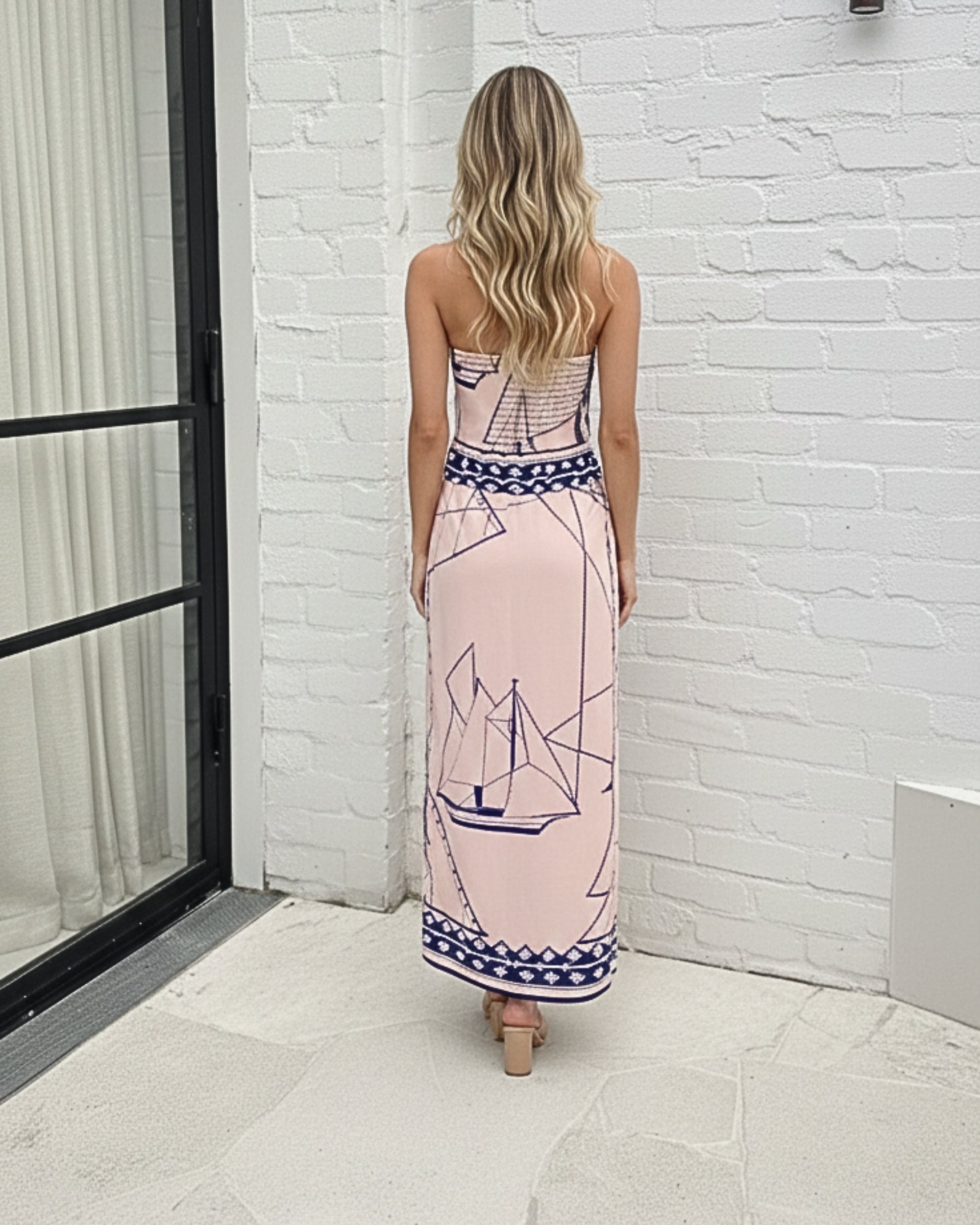 Women's apricot print strapless maxi dress front view by Esther & Co