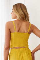 Women's bright mango crop top rear view by Esther & Co