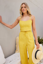 Women's mango yellow shirred crop top by Esther & Co